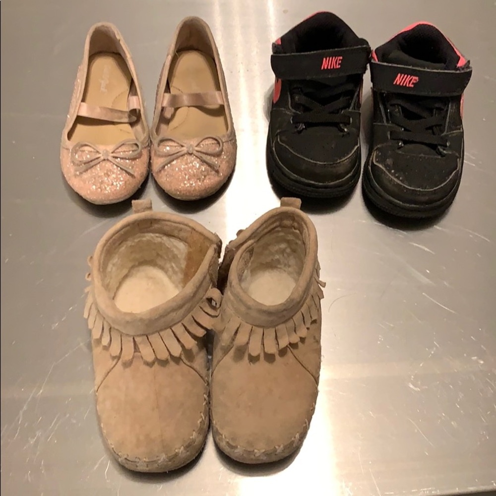 Assortment of size 6 toddler girl shoes.